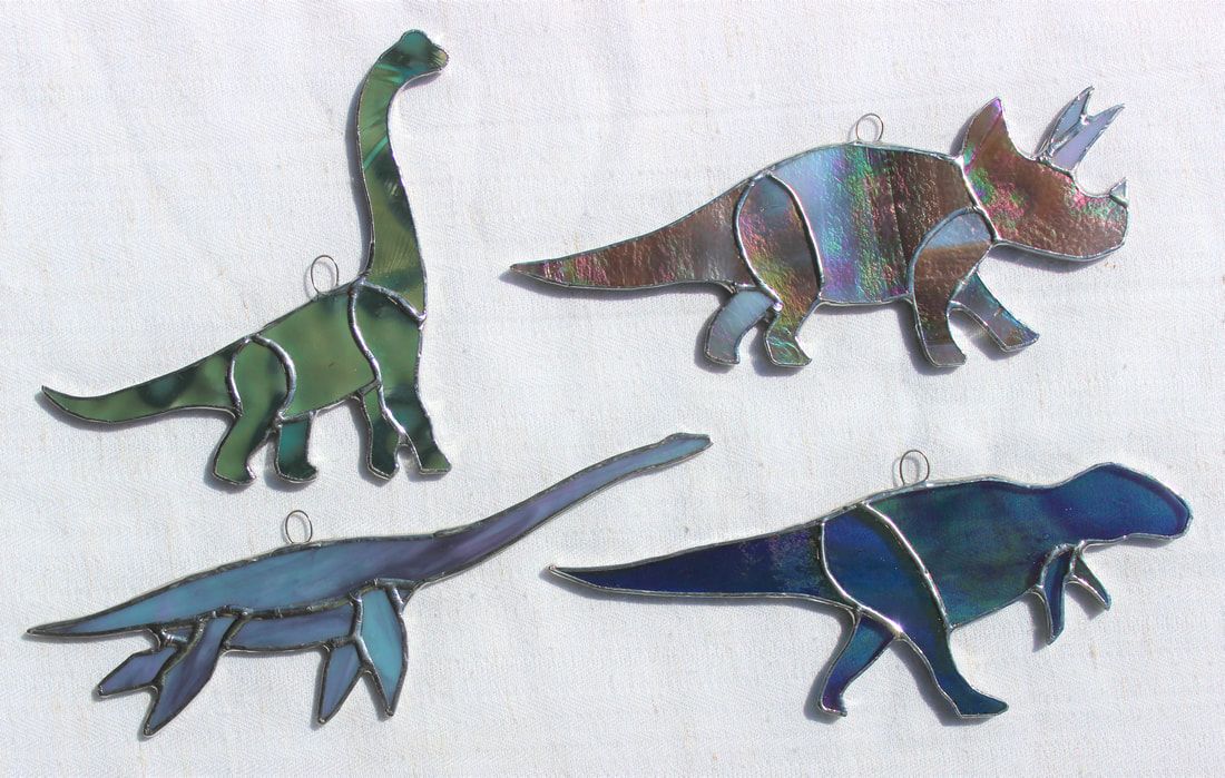 dinosaurs: brachiosaurus, triceratops, T. rex, and plesiosaurus
