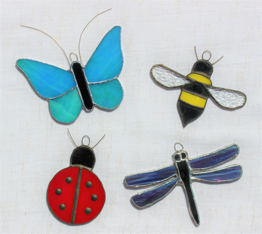 butterfly, bee, ladybug, and dragonfly