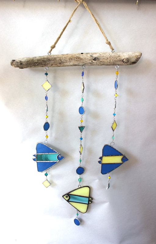 driftwood wind catcher with angelfish, blue, yellow, and green